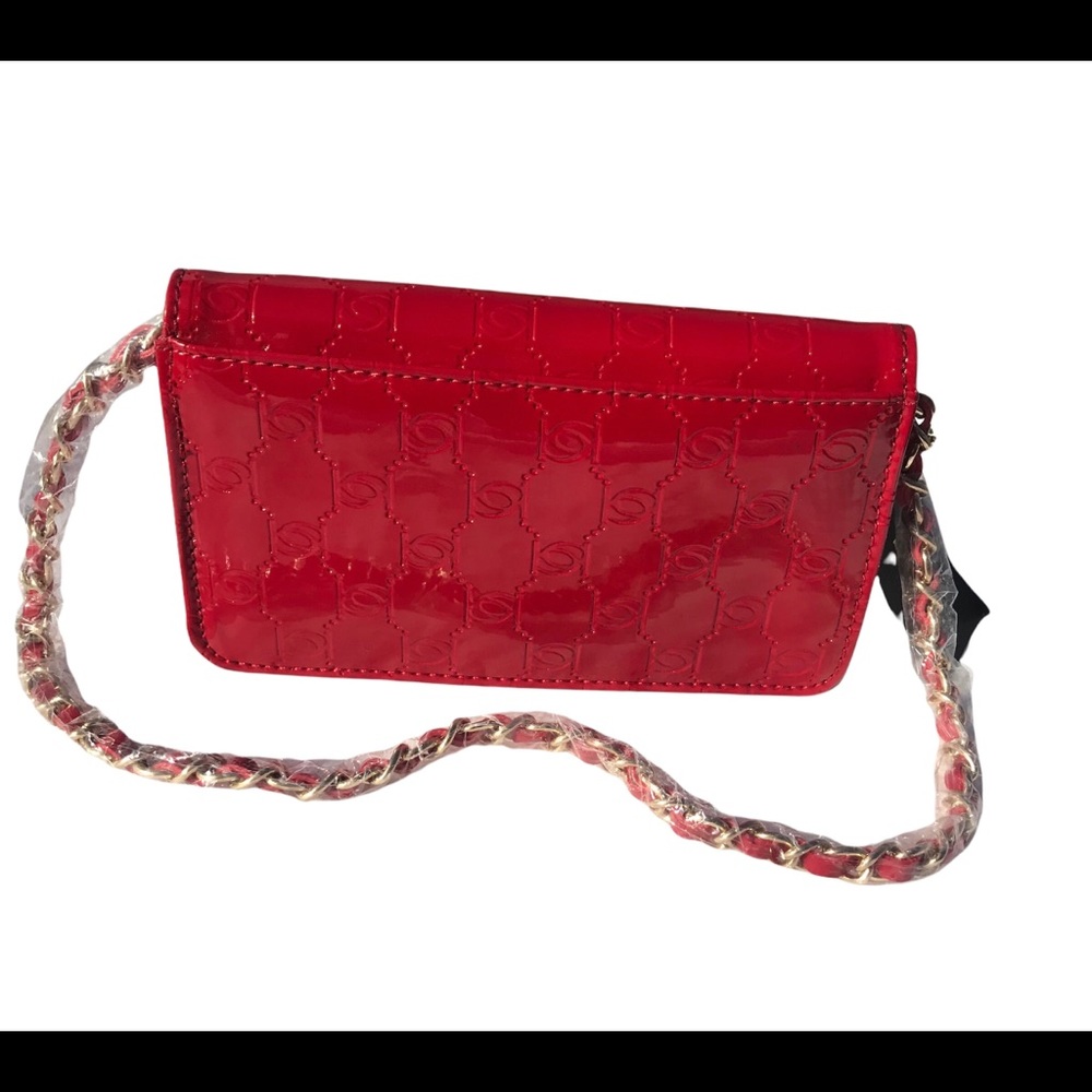 Bebe ,women’s red Mini purse  .